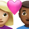 Couple With Heart: Woman, Man, Medium-Light Skin Tone, Medium-Dark Skin Tone Emoji 👩🏼‍❤️‍👨🏾 image - Apple style