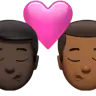 Kiss: Man, Man, Dark Skin Tone, Medium-Dark Skin Tone Emoji 👨🏿‍❤️‍💋‍👨🏾 image - Apple style