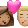 Kiss: Woman, Man, Medium Skin Tone, Medium-Light Skin Tone Emoji 👩🏽‍❤️‍💋‍👨🏼 image - Apple style