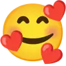 Uśmiechnięta twarz z uśmiechniętymi oczami i trzema sercami Emoji 🥰 image - Google Noto Color style