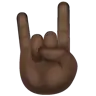 Sign Of The Horns: Dark Skin Tone Emoji 🤘🏿 image - WhatsApp style