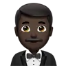 Man In Tuxedo: Dark Skin Tone Emoji 🤵🏿‍♂️ image - Apple style