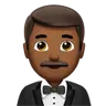 Man In Tuxedo: Medium-Dark Skin Tone Emoji 🤵🏾‍♂️ image - Apple style