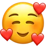 Uśmiechnięta twarz z uśmiechniętymi oczami i trzema sercami Emoji 🥰 image - Apple style