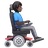 Man In Motorized Wheelchair Facing Right: Dark Skin Tone