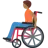 Person In Manual Wheelchair: Medium-Dark Skin Tone