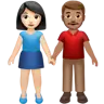 Woman And Man Holding Hands: Light Skin Tone, Medium Skin Tone Emoji 👩🏻‍🤝‍👨🏽 image - Apple style
