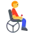 Man In Motorized Wheelchair